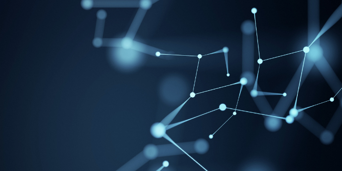 Abstract network of glowing blue nodes connected by lines on a dark background, symbolizing data or technology.